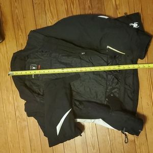 Black and white Spyder winter jacket, size 10 .